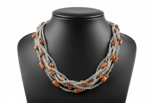 Load image into Gallery viewer, a necklace of silver chains with BROWN colored STONES on a black faux leather jewelry display bust with a white background