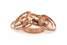 Load image into Gallery viewer, copper bracelets, consisting of elastic, cuff and bangle styles, clustered together with a white background