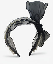 Load image into Gallery viewer, Black headband with sheer fabric and pearls on a white background
